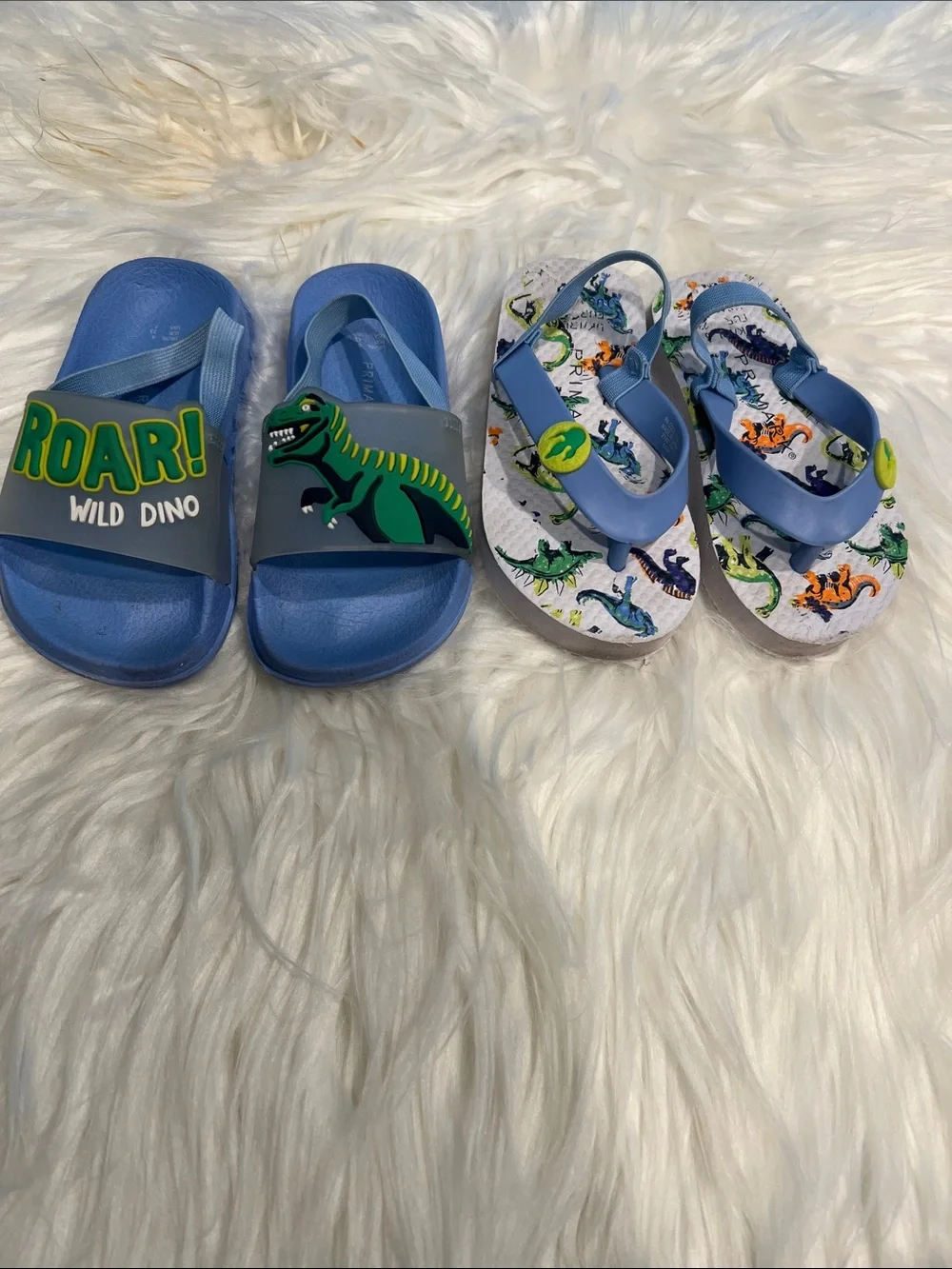 5/$35 2 used pair of Blue Dino Kids Slide Sandals - one is a size 7 & other 5/6